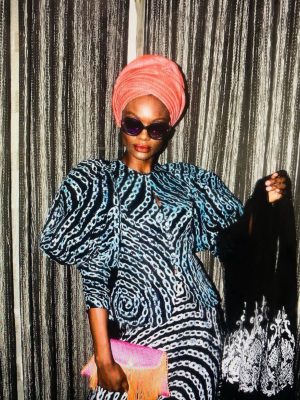 Adire fitted blouse with puff sleeves and straight sleeves